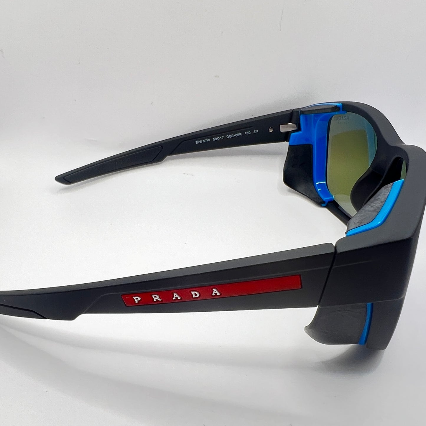 Prada SPS 07W DGO-09R 59#17 130 3N Sunglasses - Black Frame, Blue Accents, Purple Mirrored Lens