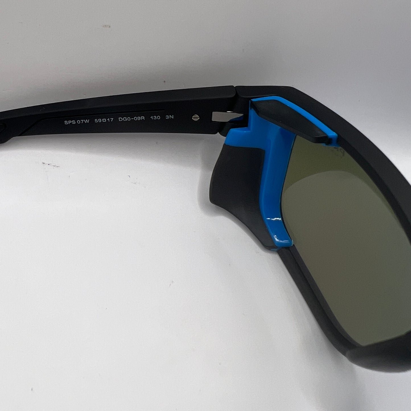 Prada SPS 07W DGO-09R 59#17 130 3N Sunglasses - Black Frame, Blue Accents, Purple Mirrored Lens