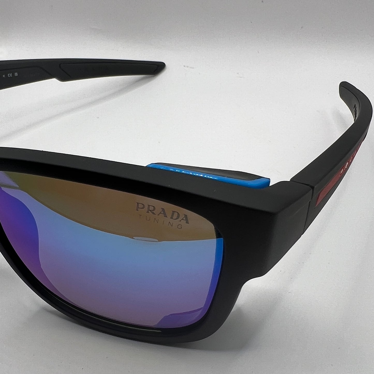 Prada SPS 07W DGO-09R 59#17 130 3N Sunglasses - Black Frame, Blue Accents, Purple Mirrored Lens